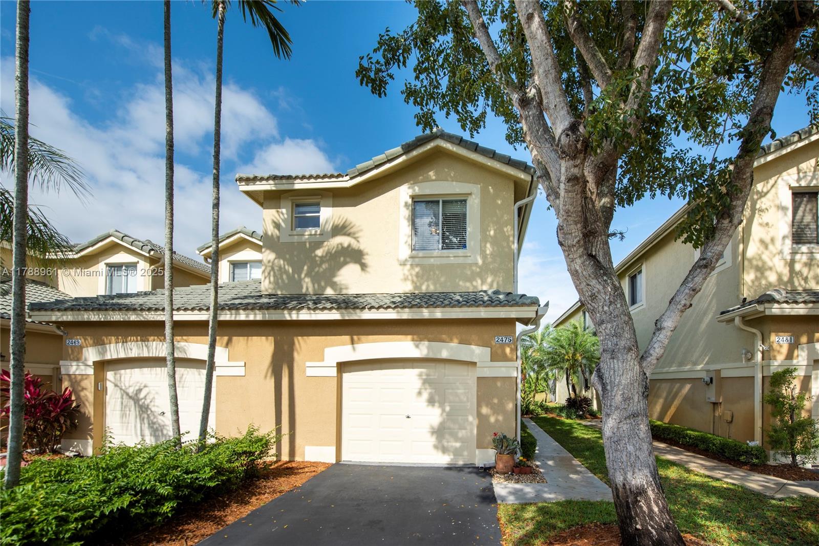 Step into this charming 4-bedroom, 2.5-bath townhome, nestled in the sought-after gated neighborhood in San Mateo, Weston. This spacious corner-lot townhouse offers abundant natural light and a rare long driveway, alongside 1car garage with ample storage perfect for organizing tools, bikes, seasonal decor and more. Enjoy *a carpet-free interior*, creating a sleek and easy-to-maintain living space. End your days taking in *breathtaking sunsets* from the screened porch with a motorized awning, providing the perfect backdrop for relaxation. Pet friendly and low HOA fees. Amenities like pool and playground. A-rated schools, proximity to major highways. As *original owners*, care and attention to detail have been evident from the start. This townhome is a rare find—schedule your showing today!