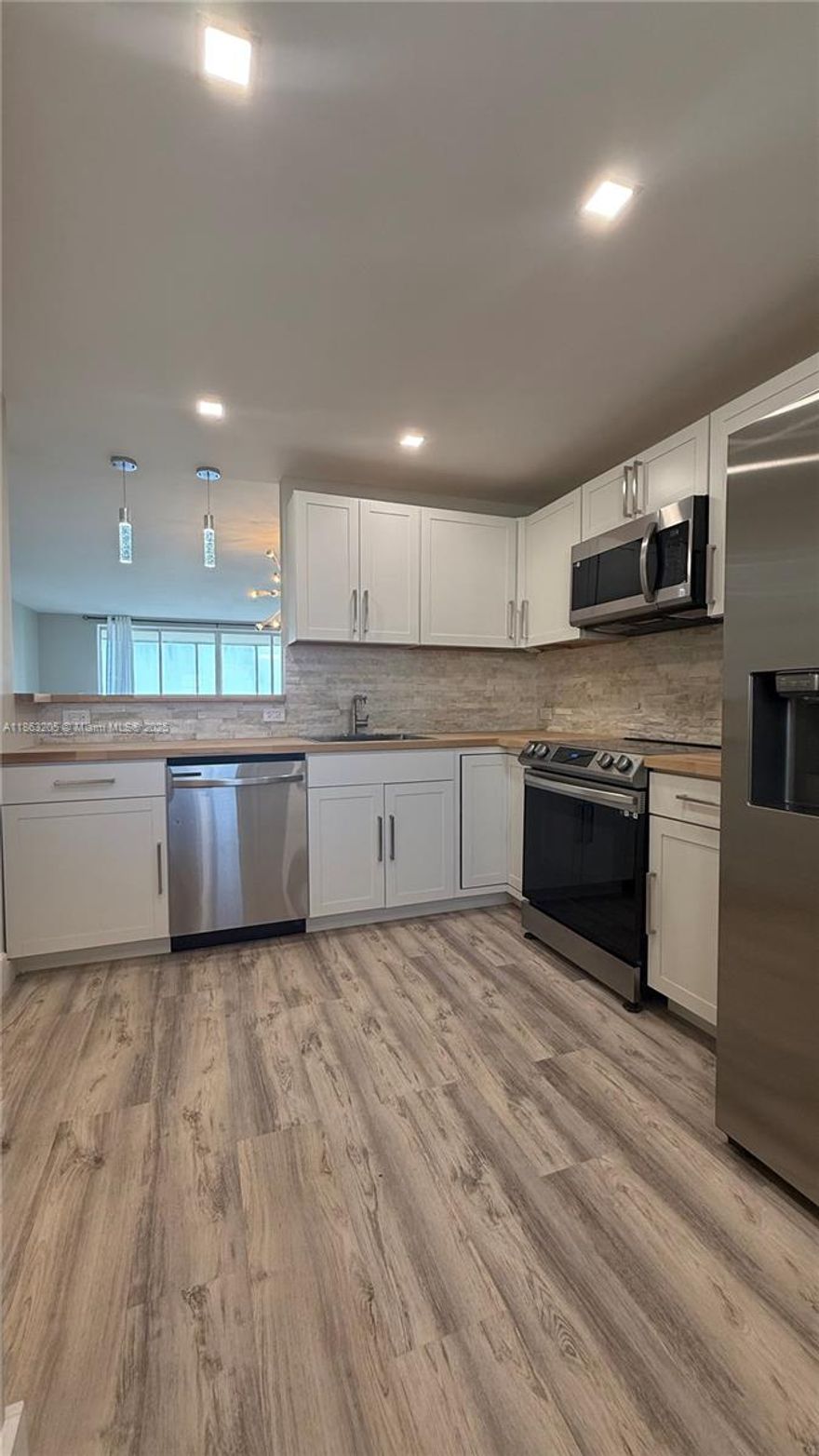 Step into this beautifully remodeled 2-bed/2-bath apartment with gorgeous lake views in Jade Winds. Unit features open-concept living space filled with natural light, sleek new flooring, updated kitchen with SS appliances, wooden countertops, custom cabinetry, and a stylish tile backsplash—ideal for both everyday living and entertaining, brand new AC!  Both bedrooms offer generous space, with the primary suite featuring a walk-in closet and an en-suite bath complete with a modern vanity and a walk-in shower. Conveniently located near shopping, dining, public transit, and local parks—this apartment offers the perfect blend of comfort, style, and location. Basic cable and internet included in rent! Can be rented partly furnished or unfurnished.