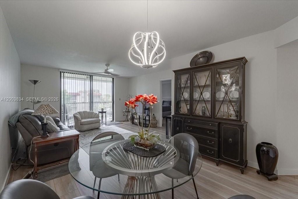 Photo of 10501 W Broward Blvd #409, Plantation, FL 33324 (MLS # A12003834)