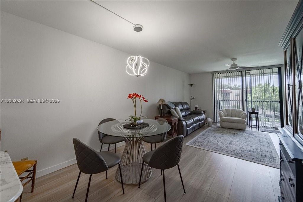 Photo of 10501 W Broward Blvd #409, Plantation, FL 33324 (MLS # A12003834)