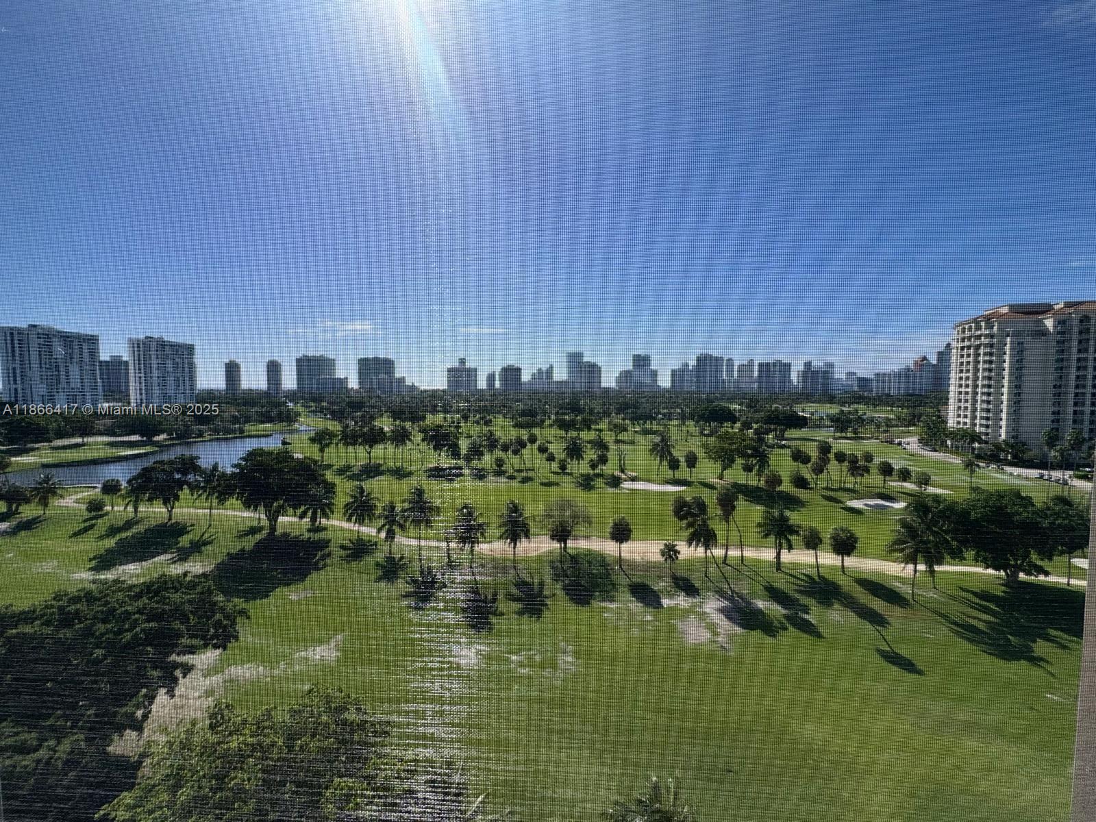 OWNER MOTIVATED!! Magnificent apartment with direct golf course views, where you can enjoy national holiday fireworks, live shows, and more! Offers a partial ocean view and a stunning night panorama of the Sunny Isles skyline. This remodeled residence features upgraded plumbing (not original), with individual shut-off valves in every room for added safety. Spacious bedrooms with generous dimensions.
Perfectly located close to everything you need—banks, restaurants, Aventura Mall, Gulfstream Park, supermarkets, library, and city hall—all just minutes away.
The building is fully equipped with a pool, sauna, fitness center, game room, assigned covered parking, and free guest parking. Nestled in the heart of Aventura’s most iconic golf course, surrounded by nature, business, and leisure.