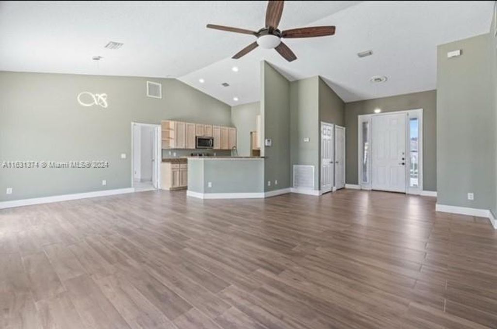 Photo of 1679 SW California Blvd, Port Saint Lucie, FL 34953 (MLS # A11631374)