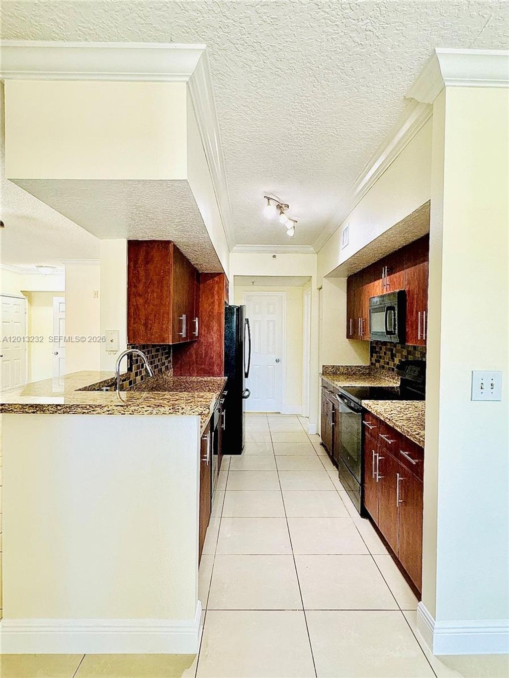 Photo of 220 SW 116th Ave #15207, Pembroke Pines, FL 33025 (MLS # A12013232)