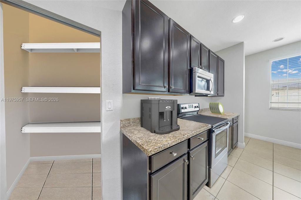 Photo of 14776 SW 10th St #10501, Pembroke Pines, FL 33027 (MLS # A11975957)