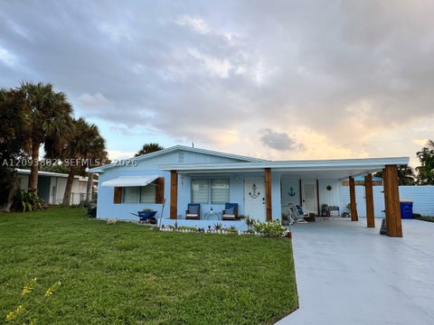 Photo of 1684 NE Hilltop St, Jensen Beach, FL 34957 (MLS # A12093882)