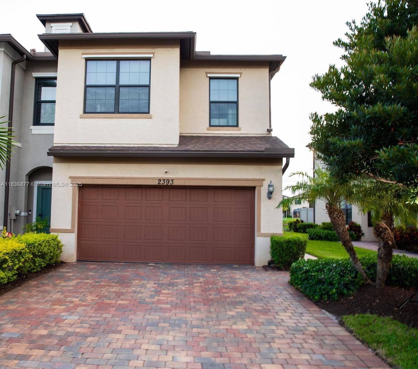 Impeccably maintained 3-bedroom, 2.5-bath corner townhome with a 2-car garage and serene lake views. Enjoy added privacy thanks to the fenced side yard, perfect for relaxing or entertaining. Inside, the open-concept kitchen features a large island, upgraded kitchen cabinetry, stainless steel appliances, and a walk-in pantry. The spacious master suite features a large walk-in closet and impact windows, glass doors in the bathrooms, a gazebo, and a private patio. Located in the coveted gated community of Preston Square, residents enjoy resort-style amenities such as a sparkling pool and fitness trails, creating a tranquil, outdoor lifestyle. This home has it all! Come see it today!
