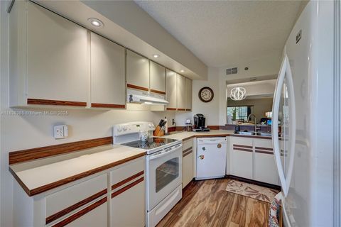 Photo of 23344 Carolwood Ln #303, Boca Raton, FL 33428 (MLS # A11838385)