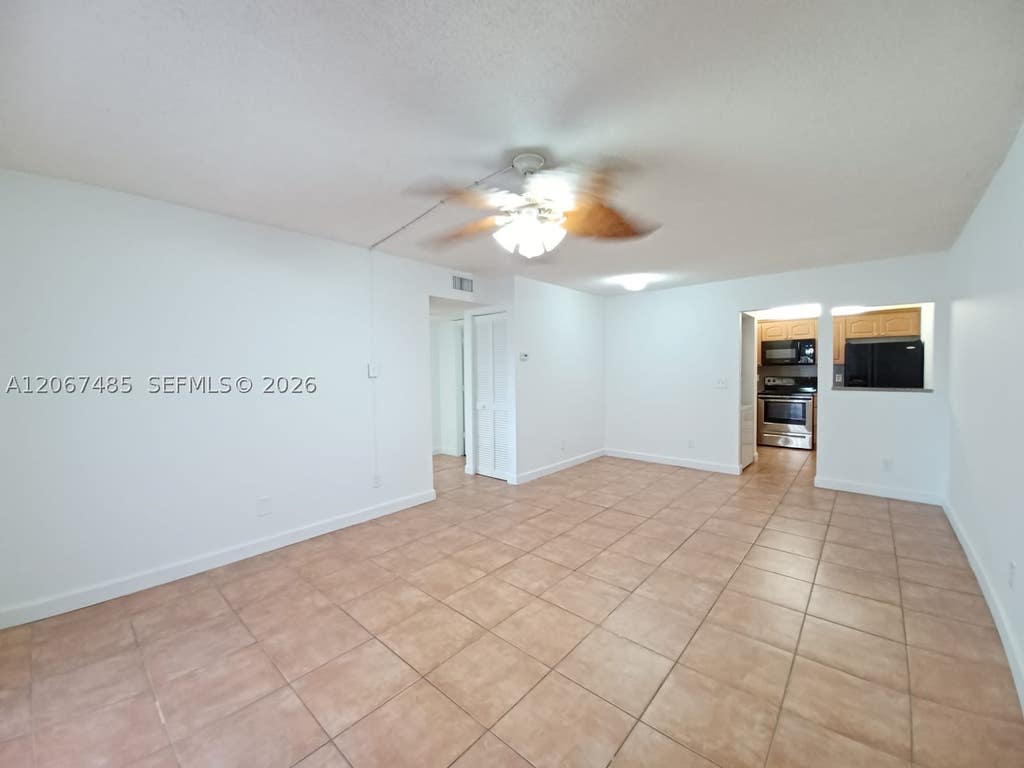 Photo of 11120 Royal Palm Blvd #4-10, Coral Springs, FL 33065 (MLS # A12067485)