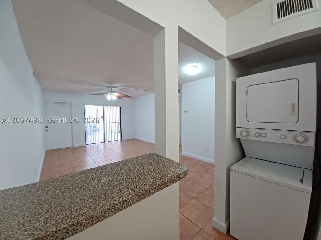 Photo of 11120 Royal Palm Blvd #4-10, Coral Springs, FL 33065 (MLS # A12067485)