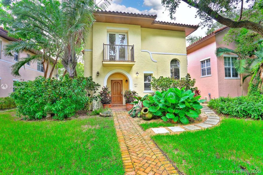 Lovely 2nd floor townhouse residence on a quiet tree-lined street in prime Gables neighborhood. Close to world-class shopping & dining in downtown Coral Gables, Coconut Grove & South Miami. Light-filled living spaces feature marble flooring, 3 balconies, crown moldings & volume ceilings ( 9.5ft). 2BR/3BA + den (easily converted to a 3rd bedroom ). Custom kitchen w/ wood cabinetry, Caesarstone countertops, stainless appliances & breakfast bar. Master suite features large walk-in closet with built-in shelving & private balcony. Impact glass windows & doors throughout. 1-car garage + additional driveway parking. Bonus- understair storage. Downstairs 2BR/2BA unit also available for sale. Easy access to downtown, MIA, Key Biscayne & the Beaches.