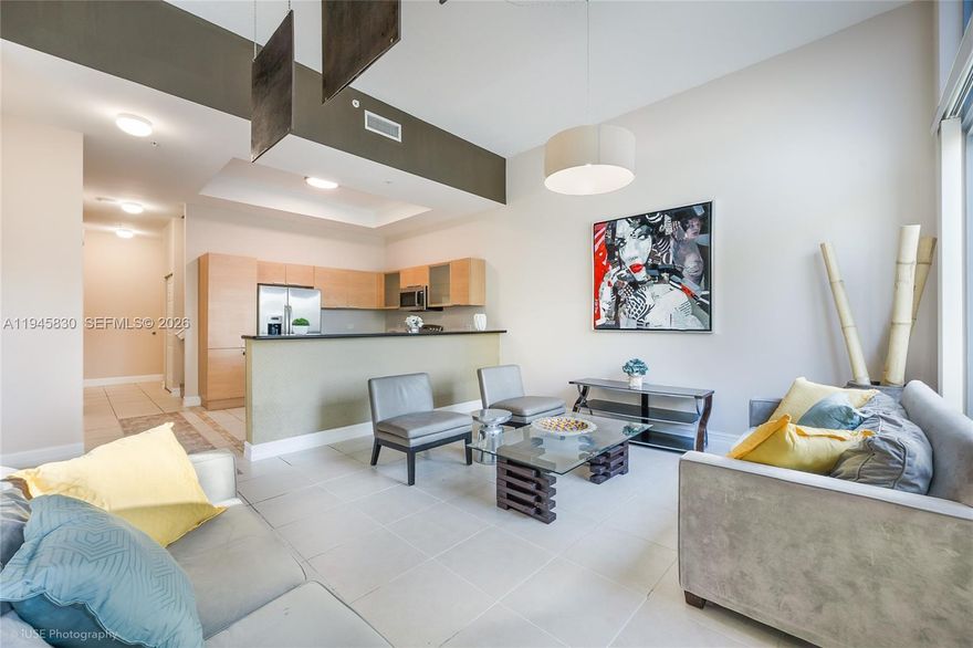 Amazing opportunity to own a spacious townhouse in the heart of a trendy and rapidly growing neighborhood. This unique residence offers 3 bedrooms, a den, and a separate dining room, providing flexible space for both comfortable living and working from home.

The townhouse features two private entrances, making it ideal for professionals, entrepreneurs, or anyone looking to operate a home-based business while maintaining privacy. Enjoy high ceilings on the first floor, creating a bright and open atmosphere perfect for entertaining or everyday living.

Convenience is unmatched with two assigned parking spaces located directly across from the townhouse entrance. The well-maintained building offers resort-style amenities including a pool, gym, office/business center, Jacuzzi, and more, delivering both comfort and lifestyle.

Located in the center of it all, you are just minutes from shopping, dining, entertainment, and major transportation routes. This property combines space, flexibility, and prime location — a rare find in today’s market.

Perfect for end users or investors seeking a versatile and high-demand property. SOLD below TAX ASSESED VALUE ($500k)