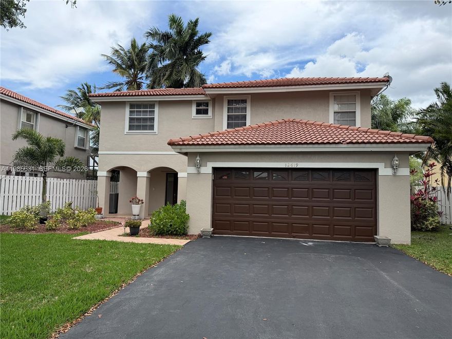 WATERFRONT HOME FOR LEASE! Welcome to this spacious 4-bedroom, 2.5-bath residence in the highly desirable Residences of Sawgrass Millls. One of the bedrooms is ideal as a studio, den, or home office, offering flexibility for today’s lifestyle.
Enjoy an unbeatable location just minutes from Sawgrass Mills Mall, major highways (I-75, Sawgrass Expressway, I-595), top shopping, dining, and entertainment, and within walking distance to Flamingo Park.
This classic South Florida two-story home features a well-maintained exterior with Mediterranean touches, including a barrel tile roof, neutral tones, and inviting curb appeal. The entrance welcomes you with a covered porch and elegant archways, while multiple windows throughout provide abundant natural light.
Inside, the home offers a spacious layout with a large kitchen, indoor laundry room, and tasteful window treatments. Step outside to a stunning waterfront setting, perfect for relaxing evenings or entertaining guests.
The property includes a 2-car garage plus an extended driveway accommodating additional vehicles. Tropical landscaping with palm trees and manicured greenery enhances the overall charm.
Located in a cohesive, family-friendly community. READY FOR IMMEDIATE OCCUPANCY. EASY TO SHOW! HOA requires credit score of 680+