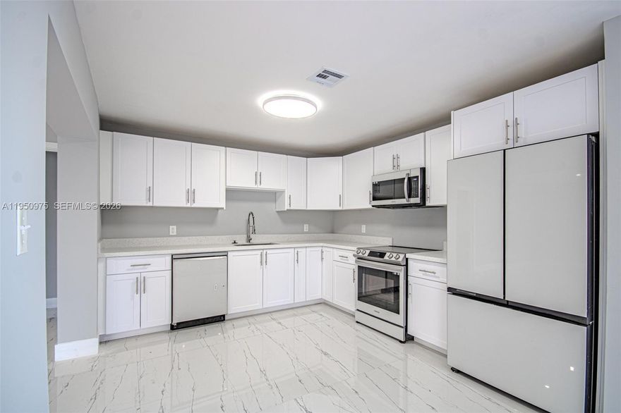 Remodeled, Wonderful floor plan ideal for the large family and for entertaining. Close proximity to Downtown Fort Lauderdale, the Turnpike, I95 and SR7. Upgrades galore. New Roof, beautiful new floors, new kitchen, new Samsung appliances new flooring throughout. Bathrooms have been substantially remodeled. Newer AC.