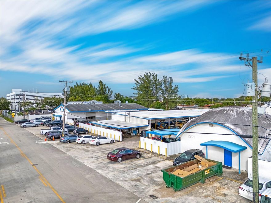 Investor Alert to this 50,000+ sqft commercial property today engaged w/ a stable long-term lease tenant operating Auto Repair/Paint enterprise business.  Sale does NOT include existing business. Sale includes only Real Estate & Buildings incorporating 2 separate folio#s that must be purchased together. Property abuts the Ludlam Trail corridor which has future area property development concepts being developed by Miami Dade County; see two new residential bldgs on Coral Way & other residential projects on Bird Rd. Property is positioned south of Braman Honda auto dealership & is located across BJs warehouse.  Further South along 69th Ct is current redevelopment in progress.  Investors acquire a stable cash flow property with long term re-development potential & great financial rewards.