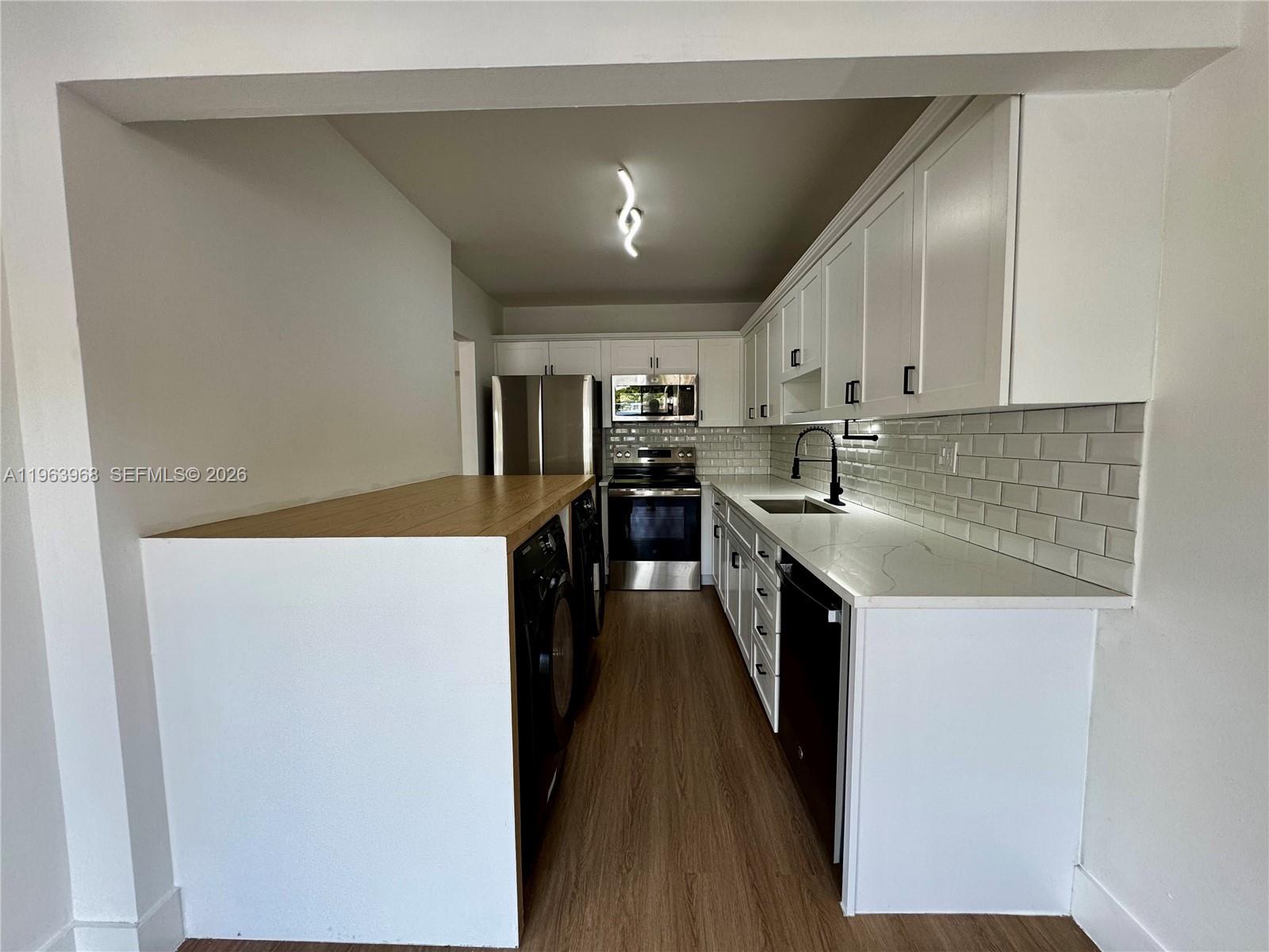 MILLER GARDENS CONDO - Residential