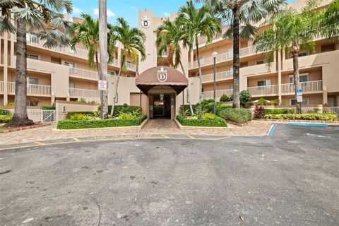 Photo of 7635 Granville Dr #206, Tamarac, FL 33321 (MLS # A11888469)