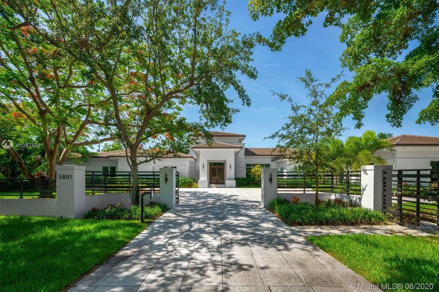 Brand new custom home poised for those w/a keen eye for detail & sophistication. Located on a quiet street in N Pinecrest, this Smart home offers impressive amenities w/elegant foyer entry, floor-to-ceiling windows, Italian porcelain floors & doors, California closets & 24 ft high ceiling in formal living area. Natural light filled Master Suite features impressive closet, dual rain shower, tub & Turkish marble wall. Gourmet kitchen boasts Wolf, Bosch & Subzero appliances featuring large butler's pantry & concealed tv. Spacious layout offers movie theater, storage room, office & mudroom. Guest will enjoy covered patio w/summer kitchen overlooking glass mosaic tile swimming pool & infinity hot tub. Generator, 2 car garage & carport. A+ rated schools, parks/bike trails nearby. Move-in ready.