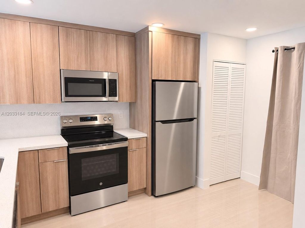 Photo of 2878 Coral Springs Dr #2878, Coral Springs, FL 33065 (MLS # A12033184)