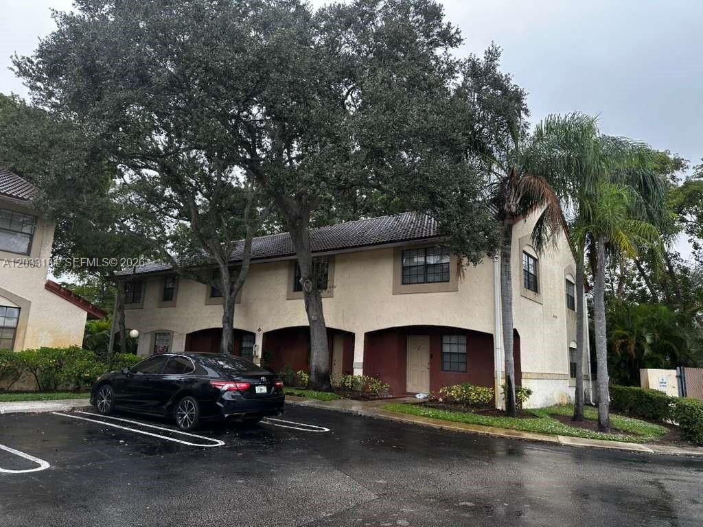 Photo of 2878 Coral Springs Dr #2878, Coral Springs, FL 33065 (MLS # A12033184)