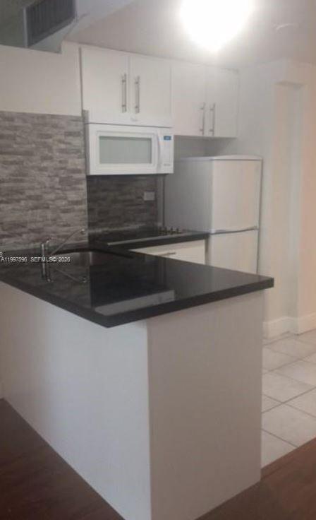 FOUR AMBASSADOR CONDO - Residential Lease