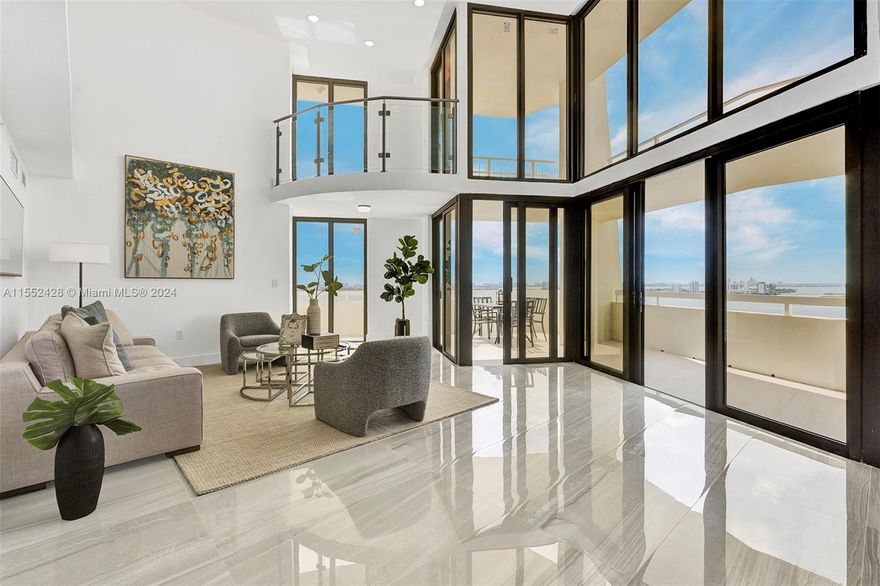 Rare opportunity to own a “Mansion in the Sky”. Unique two-story (24th & 25th floors) luxury corner waterfront penthouse with breathtaking ocean & intracoastal views. Fabulous 55ft. entertainment space living, dining room (staged) & gourmet kitchen with wine cooler & pantry. 6 glass doors opening onto a large wraparound balcony. This stunning condominium boasts 3,632sq.ft. Includes two stories of impact windows, 15.5ft. ceiling in the living room, porcelain tile floors throughout, 4 bedrooms & 4 bathrooms, second floor kitchenette, abundant of closets. Upstairs offers a 30ft. balcony opening off the bedrooms. Includes a 50ft. boat slip. The Towers of Quayside is a gated community on 32 acres. 24/7 security, Gym/spa, tennis/pickleball courts, marina, restaurants, dog park &2 parking spaces.