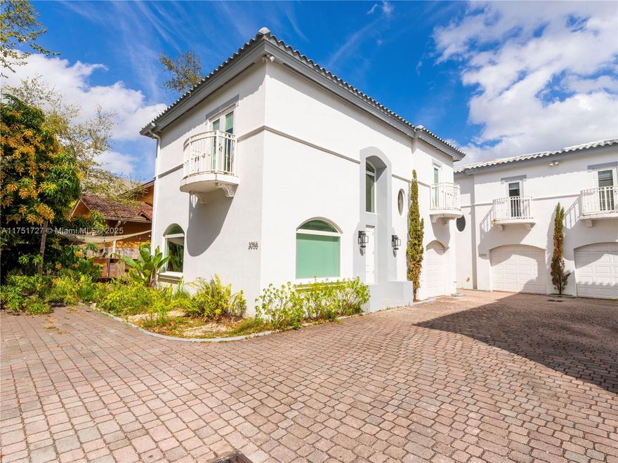 Enjoy the trendy style of Coconut Grove living in this updated 3-bedroom, 2.5-bath townhome with high ceilings and a flowing layout that transitions seamlessly between spaces. 
With a renovated kitchen, custom cabinetry, and a spacious island, this home offers both style and functionality, perfect for cooking, dining and entertaining. Situated in a gated community of only four townhomes and surrounded by beautiful new homes, you will be able to walk to Coconut Grove’s vibrant dining, shopping, and parks. With a garage attached and very low HOA fees, this townhome offers a rare opportunity to own in one of Miami’s most desirable neighborhoods.
