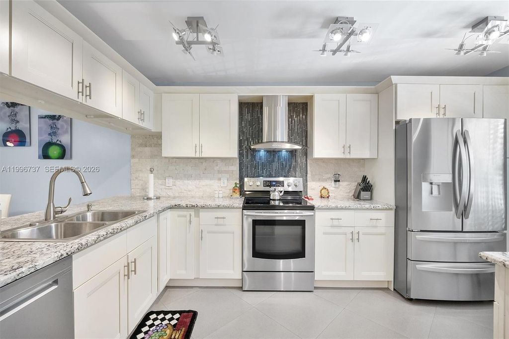 Photo of 3505 Oaks Way #308, Pompano Beach, FL 33069 (MLS # A11996737)