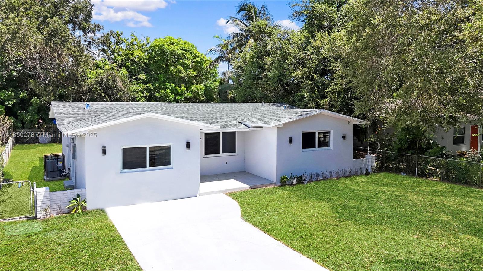 Enjoy modern living in this fully remodeled 4-bed, 2-bath home on a spacious 6,300 sq ft lot with a desirable south-facing entrance for natural light and energy efficiency. With 1,898 sq ft of well-designed space, this move-in-ready residence fits today’s lifestyle. The 2024 gourmet kitchen features granite waterfall counters, upgraded stainless steel appliances, microwave& oven, a 3-compartment fridge, dishwasher, and sleek white cabinets. Major updates: 2024 roof, impact windows, new AC, ADT alarm, 2023 electrical panel, and 2020 water heater for peace of mind. A private entrance offers the perfect setup for an efficiency unit. Bright interiors and a comfortable outdoor area make this home a standout for living or investing. Concession available for strong offers—ask for details!