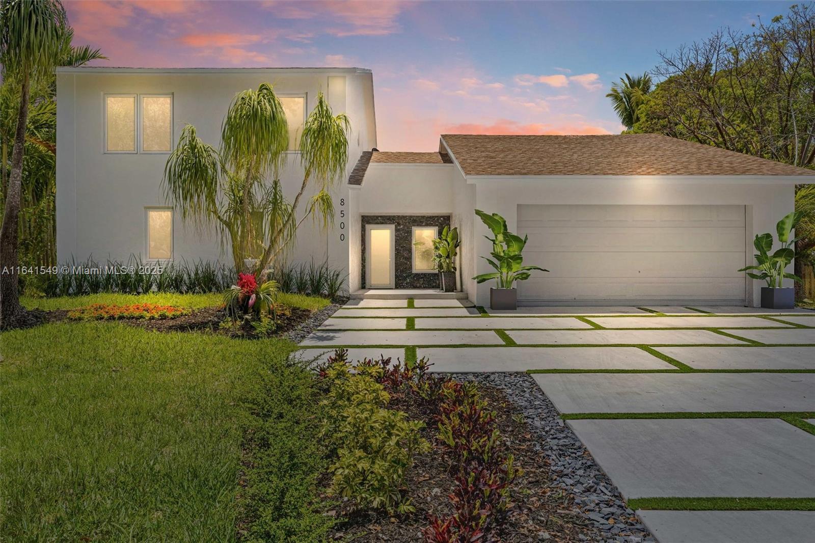 This exquisitely fully remodeled two-floor home where modern design blends with organic elegance to create a refined yet inviting atmosphere. New roof, full-impact windows/doors provide for safety and lots of natural light to open social spaces with sleek porcelain floors displaying a striking kitchen with Calacatta /Silestone finishes and A1 appliances. An exuberant 825 sqft covered terrace, perfect for family entertainment, opens to a lush garden with a basketball court. A X-Large master suite with spacious walk-in closet, balconies and spa-like bath crowns this incredible distributed property (5 bed/4 bath+bonus room) near top-rated schools, highways, parks, and shopping for classy lifestyle.