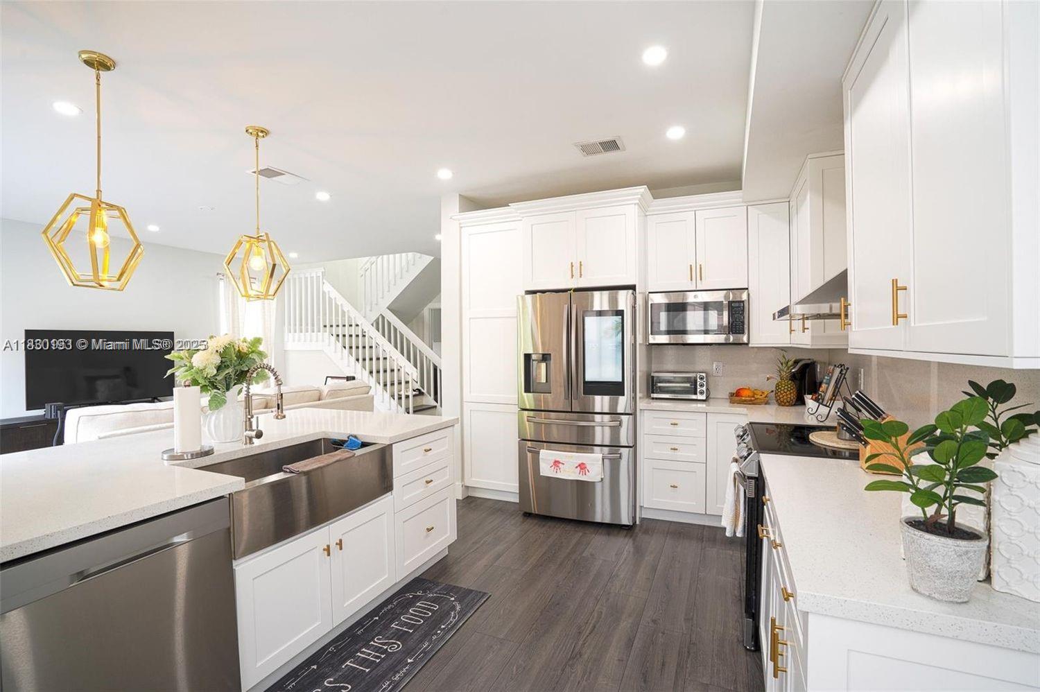 Best value home in the area! Beautiful,fully renovated, this two-story property is in the highly sought-after gated community of Huntington, with easy access to major highways, restaurants, and shops. It features 3 bedrooms, 2.5 bathrooms, a spacious primary suite with walk-in closet, 2-car garage, new impact-resistant windows and doors (2022),new roof (2018),modern kitchen with stainless steel appliances (2020)custom built-in bar, new laminate floors (2020), smart lighting with updated switches, renovated bathroom, ongoing Terminix service, a large backyard with jacuzzi.All this in a secure gated community with low HOA fees.text me