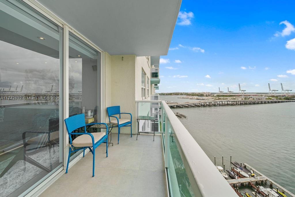 Spacious 3-bedroom at The Floridian with direct bay views and marble flooring throughout. Features an upgraded kitchen and bathrooms, ample closet space, a private balcony, and a full-size washer and dryer. Comes with one covered parking spot in a full-amenity building.