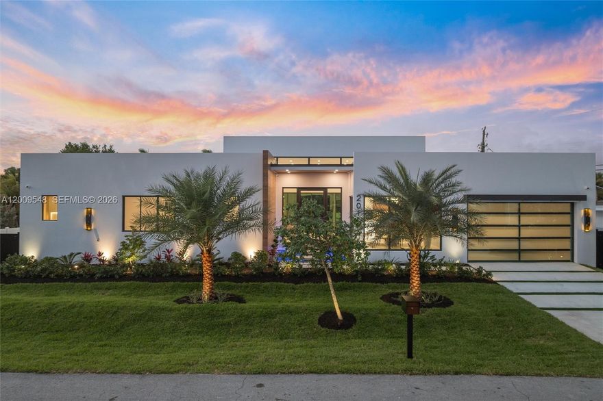 A rare opportunity to own a newly built 2026 residence with standout design and exceptional features, just minutes from Wilton Drive, Fort Lauderdale beaches, and Las Olas. This architecturally striking 4-bedroom, 4.5-bath home sits on a 10,000 sq. ft. lot in a prime section of Wilton Manors. Designed to impress, the home blends bold, loft-like scale with seamless indoor-outdoor living, highlighted by dramatic 15-foot ceilings and walls of glass. The process went well beyond drywall and paint, and every corner of this home has been carefully curated for those who appreciate the finer details. From a showcase kitchen crafted with Cristallo slabs and a Wolf gas cooktop to a dramatic floating stair and waterfall entry, the home features smart home control with audio and video, seamlessly opening to a private, resort-style backyard with heated saltwater pool, spa, and lush outdoor living, along with two primary bedroom suites—one featuring a tropical outdoor shower. This is more than a residence—it is a fully realized living environment designed to be experienced, an opportunity to own a true statement home built for both everyday living and unforgettable moments. Key features include smart switchable privacy film for garage/living room glass, EV chargers, dual-zone HVAC, smart pool controls, gas cooking, and stunning hardscape and outdoor design.