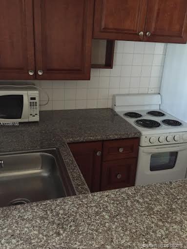 Updated 1/1 with fenced in court yard!! Apt has tile through out ,all new appliances with updated open kitchen ,updated bath and high ceilings . Enjoy living in the heart of Victoria park and walk to Las olas ,downtown fort lauderdale grocery and beaches!! pets considered but breed restricted with 250$ non refundable pet deposit . $50 Background check required but move in TODAY . laundry is on site in the rear of the building .