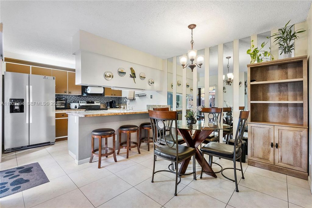 Photo of 5924 NW 54th Ln, Tamarac, FL 33319 (MLS # A11903794)