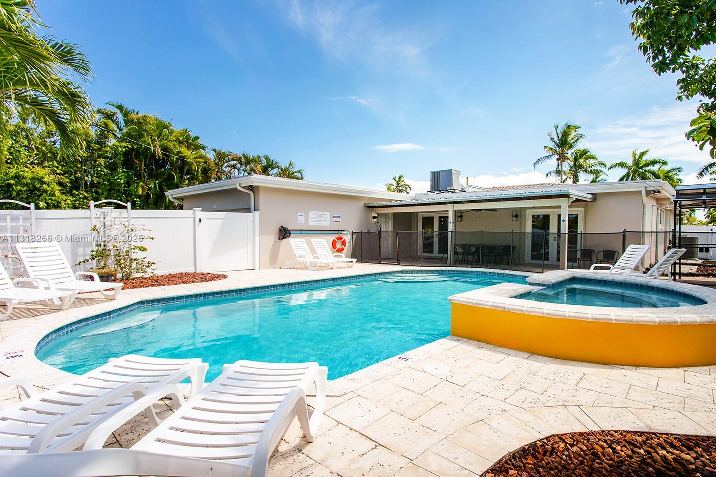 This is a short term Monthly/Weekly Rental.
Monthly rate $12,500.
Call agent for a Weekly Rent Price.
Brand New, Luxury 5 Bedrooms/4 Baths Villa. Located on one of the most gorgeous blocks of Hollywood Lakes only 2 mi or 4-5 minutes drive from the famous Hollywood Beach & Boardwalk and minutes from the Restaurants, Bars, Casinos, and more...
2400 sq ft Villa on 10000 sq ft Estate has a new heated saltwater pool with a beautiful patio which will further enhance the experience of staying at this warm and inviting place.