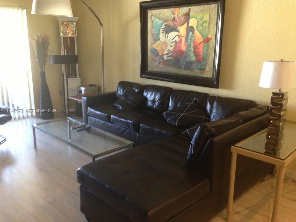 Photo of 2880 N Oakland Forest Dr #313, Oakland Park, FL 33309 (MLS # A11945572)