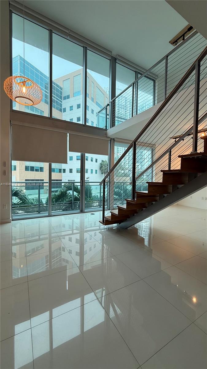 Beautiful and spacious 2 bedroom, 2 bath Loft-Style residence in Wind Condominium. Floor to ceiling windows and 1029 SF of modern living space. This light-filled residence features an open layout with a sleek European kitchen, stainless steel appliances and granite countertop. Wind is a river front condo with top-tier amenities, in a gated community and close distance to Brickell City Centre, Metro mover and the Financial District of Brickell. Amenities include a Clubhouse, Men and women spa with steam room and sauna, private massage rooms, state of-the-art two story gym, sports lounge, cigar parlor and playroom, 40,000 square foot outdoor tropical oasis with a River front pool, 24-hour valet, and professional concierge.