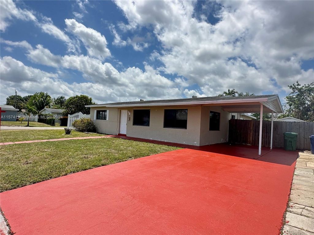 Photo of 1261 NW 54th Ter, Lauderhill, FL 33313 (MLS # A11574190)