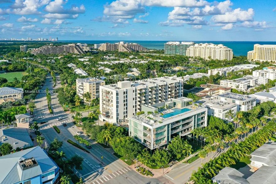 Move right in! Fully remodeled top-floor 2/2 in the heart of Key Biscayne. NEW KITCHEN with large quartz counter, extra beverage refrigerator, and plenty of pantry space. NEW BATHROOMS, ample custom closets in both bedrooms, and with main bedroom featuring an office nook ideal for working from home. Large glass-enclosed balcony with southern exposure to relax and watch the sunset from this top-floor apartment. Travertine floors in living area, waterproof Pergo floors in kitchen area with beautiful light fixtures and fans throughout. Furniture negotiable, turn key ready! Located in the heart of Key Biscayne. Closest to Village Green Park, A+Rated K-8 Public School, Shopping, and the Beach. Walk to it all, or enjoy driving your golf-cart within this Village paradise.