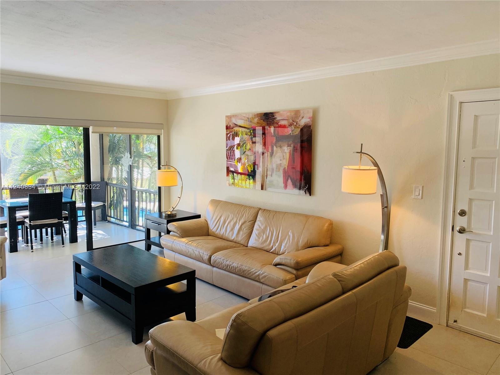 Beautiful, move-in-ready, corner unit, featuring an oversized covered balcony, overlooking a serene pool, lush gardens, and golf course. This immaculate 2 Bedrooms, 2 Bathrooms condo can also be sold furnished. Covered parking, and large storage under the building. This gated community that welcomes all ages, is close to shops and dining. A MUST-SEE!!!!