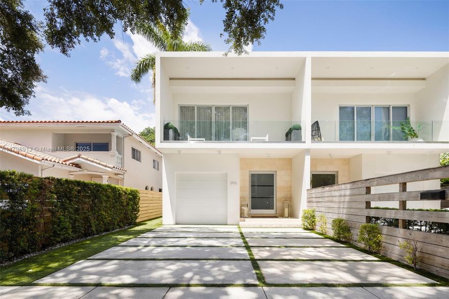 Stunning modern-style townhome on a quiet cul-de-sac street - just a short walk or bike ride to the historic village of Coconut Grove. Enter light-filled living spaces with volume ceilings, frameless glass staircase & porcelain tile flooring. Expansive, top-of-the line kitchen features sleek wood cabinetry, Thermador appliances, induction range & wine refrigeration. Unique layout  has 4 Bedrooms+ office- including the primary suite w/sitting area, extensive closet space w/ custom built-ins. Enjoy outdoor living & entertaining in the ultra-private backyard w/ covered terrace & tropical pool. Other notable features include: 2 summer kitchens (ground level & on rooftop terrace), 4 parking spaces + 1 CG. Located close to bayfront parks & marinas and just minutes to downtown, MIA & the Beaches.