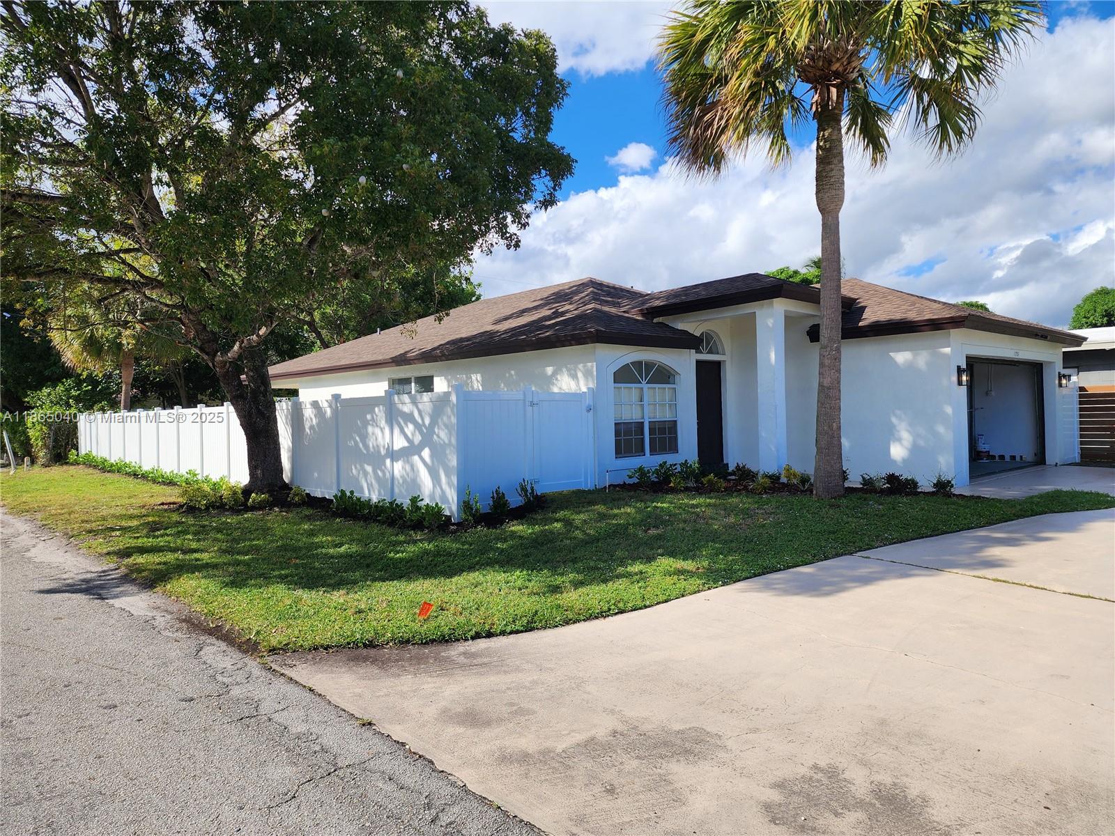 This newer-construction, fully updated 3-bedroom, 2-bath home showcases modern living at its best. Featuring a 2-car garage, brand-new roof (2024), & new AC unit, it’s move-in ready for years of worry-free comfort. The open interior shines with LED lighting, fresh interior & exterior paint, & durable waterproof laminate flooring. The kitchen is a true highlight with sleek quartz countertops & brand-new appliances. Outdoors, enjoy privacy with a vinyl perimeter fence, a roofed terrace, & a covered patio-perfect for entertaining. The oversized yard offers plenty of space for a pool, while the expansive driveway accommodates up to 9 vehicles. Ideally located near Wilton Manors, you’ll have easy access to shopping, dining, & vibrant nightlife. A must-see in a prime location—easy to show!
