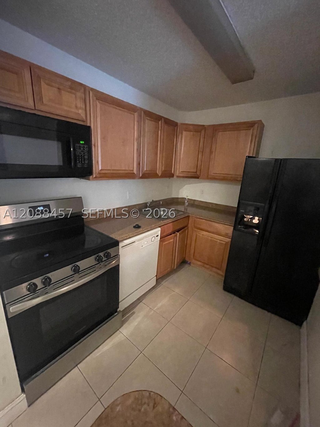 Photo of 10773 Cleary Blvd #103, Plantation, FL 33324 (MLS # A12088457)
