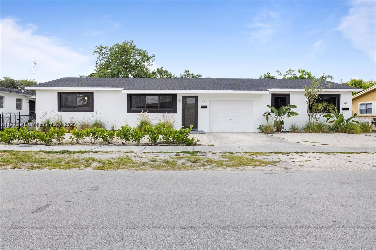 Turnkey Duplex investment on an 8,800 sq ft lot, fully upgraded for long-term peace of mind. Featuring a new roof, hurricane-impact windows/doors, new Washer & Dryer in each unit with new drains, modern kitchens, new baths, tankless water heaters, central A/C, and new appliances with warranties, this 2,521 sq ft property offers low insurance costs and high efficiency. The larger unit boasts 3 bedrooms (can convert to 4), spacious living/dining, laundry room, while the second unit offers open-concept living. With fresh landscaping, privacy fencing, and strong rental potential, this is a turnkey opportunity in a no-flood zone.Centrally located, making it very convenient and accessible to all major destinations and the i95, both airports, the city, and strongly positioned for long-term growth