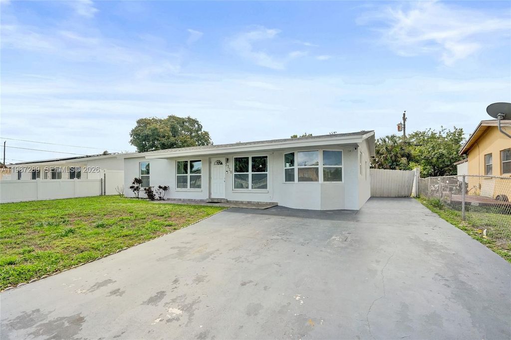 Photo of 3320 NW 18th St, Lauderhill, FL 33311 (MLS # A11987289)