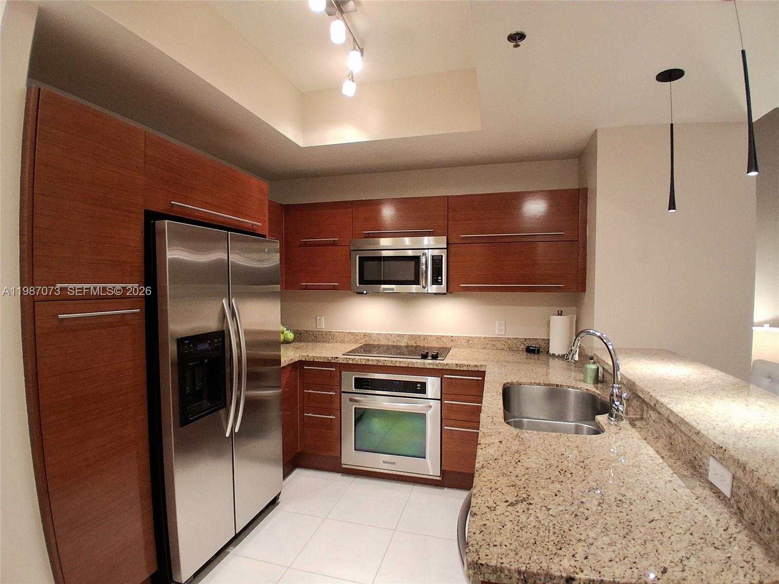 TAO SAWGRASS CONDOMINIUM - Residential Lease