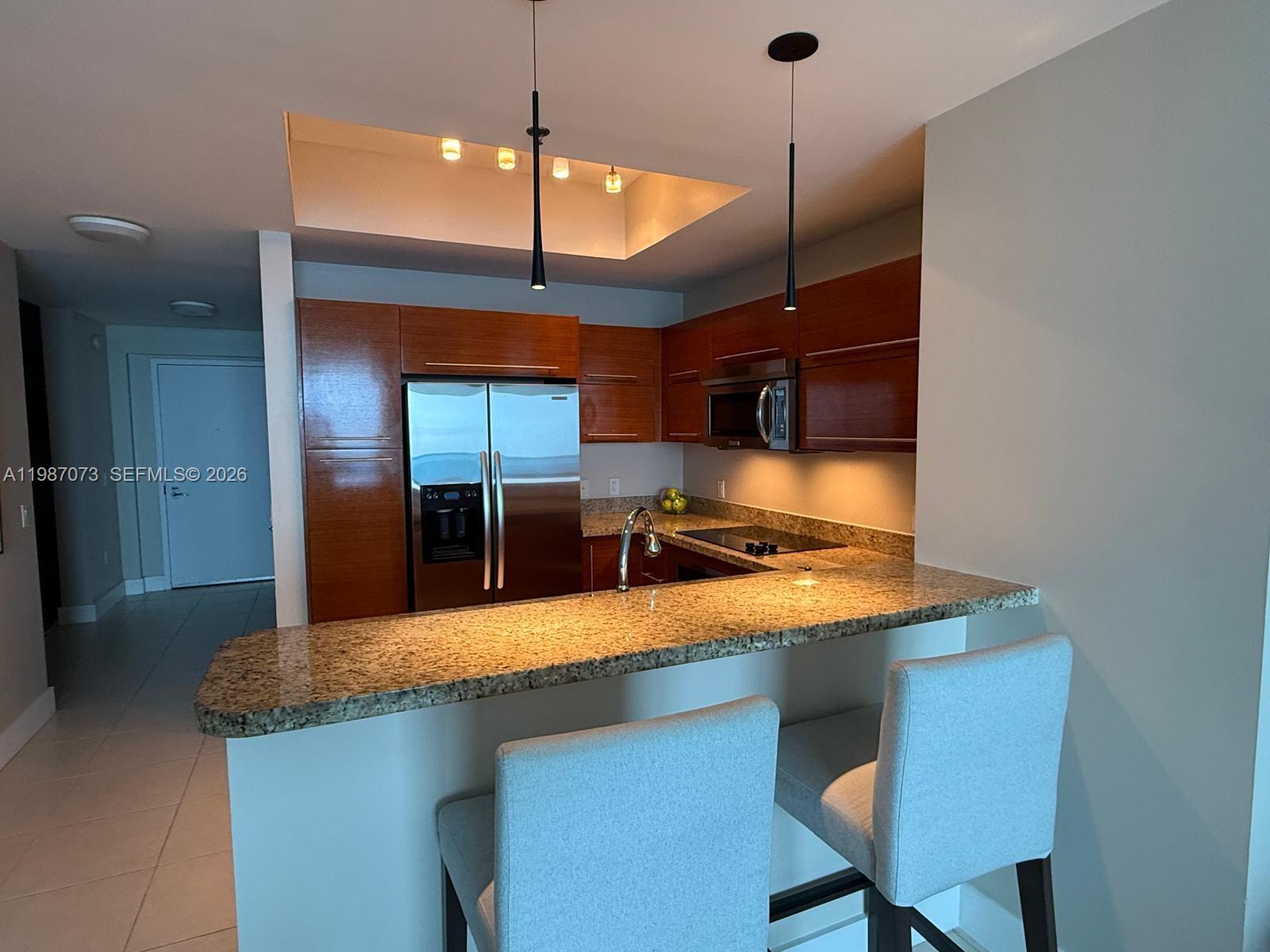 TAO SAWGRASS CONDOMINIUM - Residential Lease