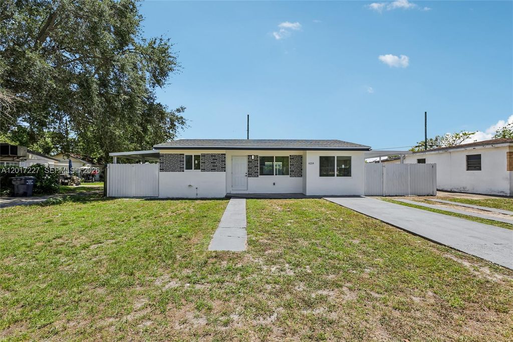 Photo of 6214 Fletcher St, Hollywood, FL 33023 (MLS # A12017227)