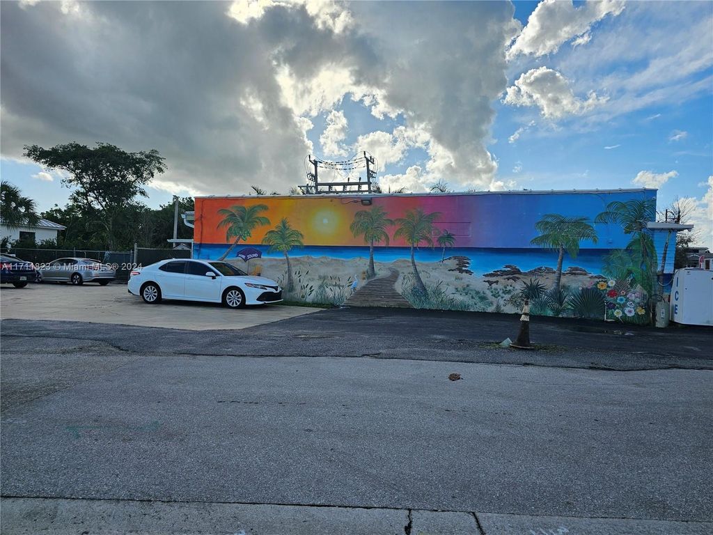 Photo of 9128 SE Bridge Rd, Hobe Sound, FL 33455 (MLS # A11711823)