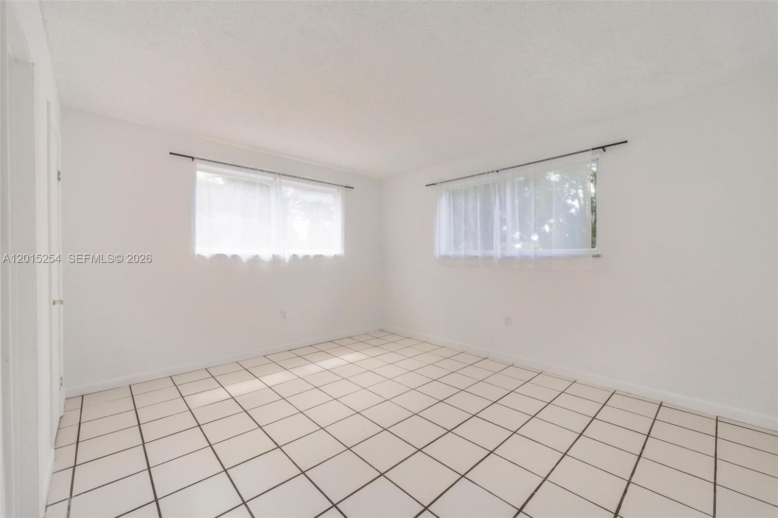 CARIBBEAN GARDENS CONDO - Residential Lease